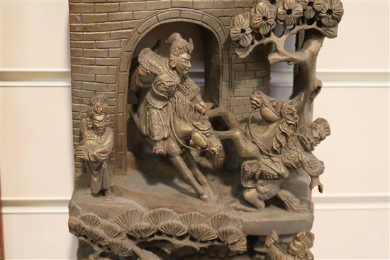 Four Chinese carved giltwood panels of battle scenes